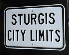 Sturgis city limits embossed motorcycle biker road sign 18×12