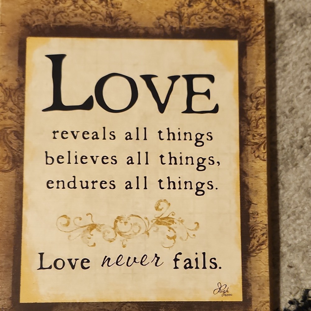 Wood Wall Plaque “Love Never Fails” Inspirational Quote Distressed Beige/Black