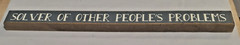 Wood Decor Sign “Solver of other Peoples Problems” quote -bookshelf My Word!