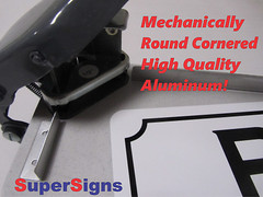 Pisser Metal Sign in Fancy Script and Black Border bathroom