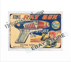 JAPANESE ATOMIC RAY GUN toy metal tin sign indoor outdoor reproductions