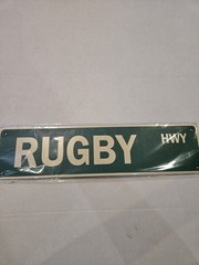 * Rugby 4″ x 18″ Metal Novelty Street Sign