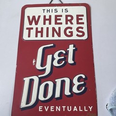 Open Road Brands Metal Wall Sign “Things Get Done Eventually”