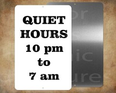 QUIET HOURS 10 PM – 7 AM 8″ x 12″ metal sign