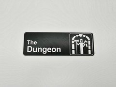The Dungeon – Funny Room Door Sign | Any Color