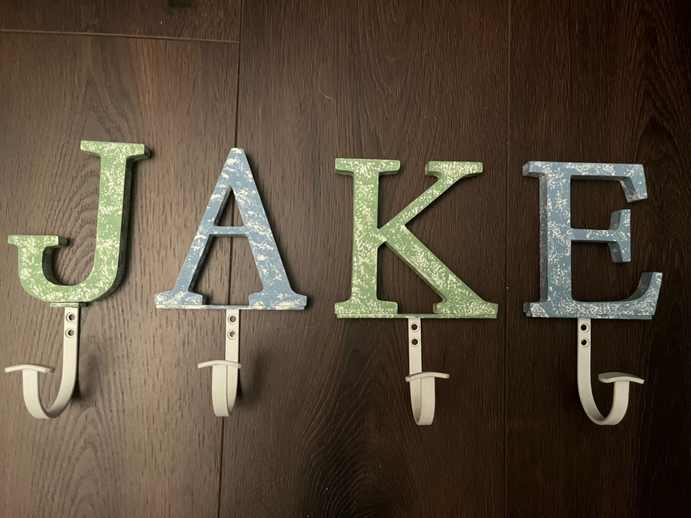JAKE letter wall hang – green and blue – hang hats or coats – 9″