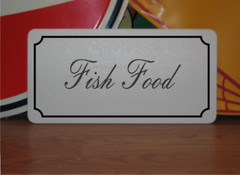 Fish Food Metal Sign in Fancy Script and Black Border