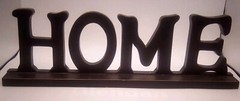 FREE STANDING 20 3/8″ L x 6 1/2″ H BLACK DISTRESSED WOOD LETTERED “HOME” SIGN