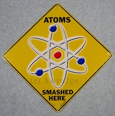 ATOMS SMASHED HERE–Crosswalks Metal 12 X 12 Science Physics Chemistry Sign